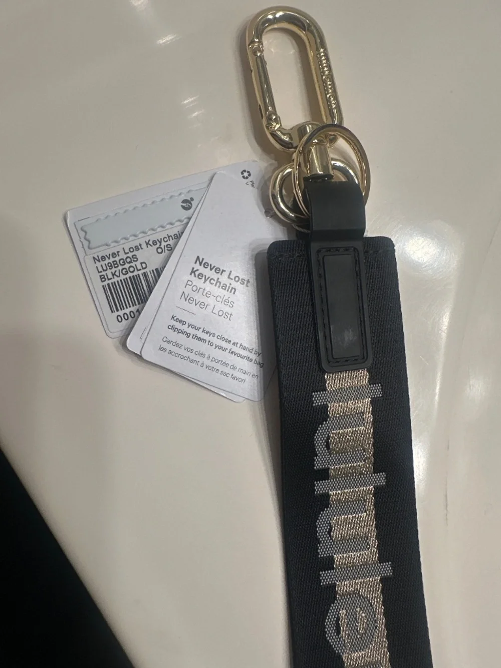 Lululemon Never Lost Keychain Black & Gold Logo Bag Charm Clip O/S